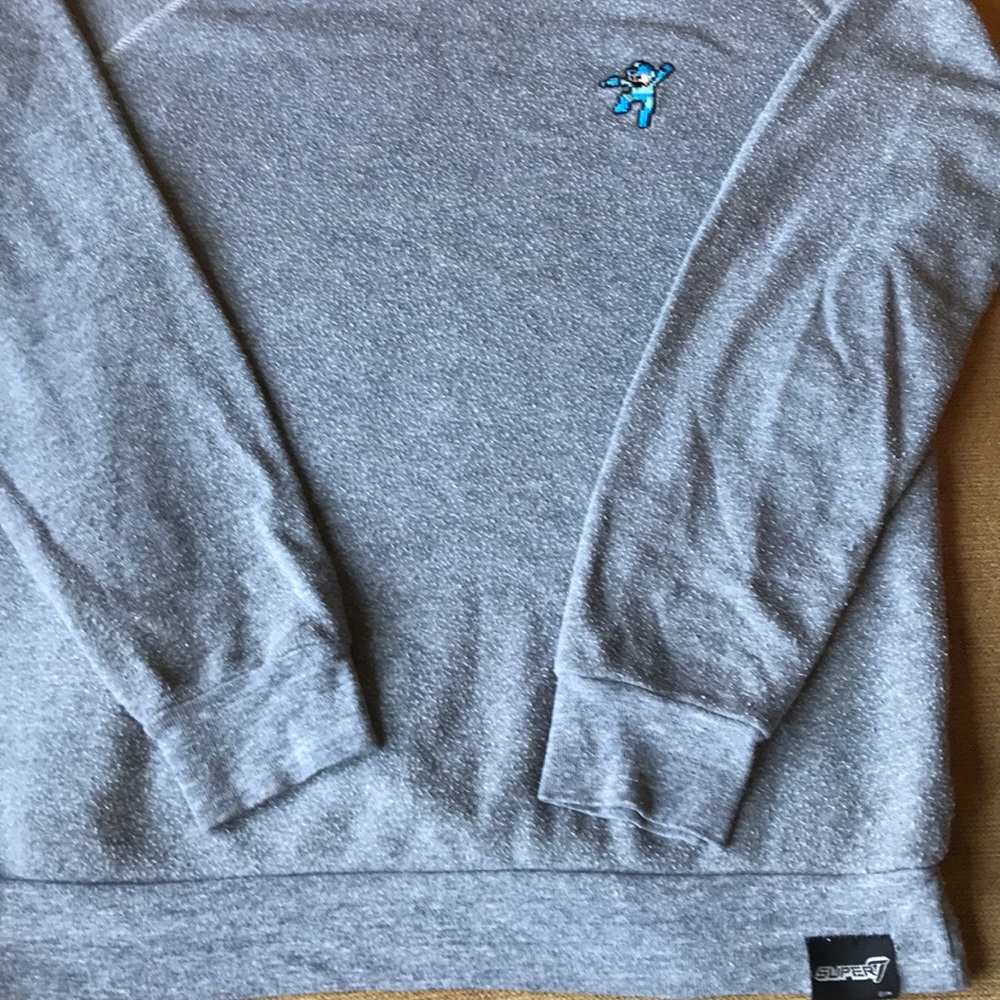 Grey Sweater with MegaMan emblem